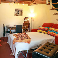 Salon avec lits ouverts